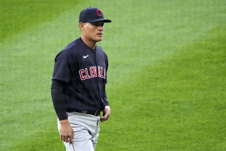 Cleveland Indians shortstop Yu Chang stretches before a game against the Chicago White Sox in Chicago on April 12, 2021.