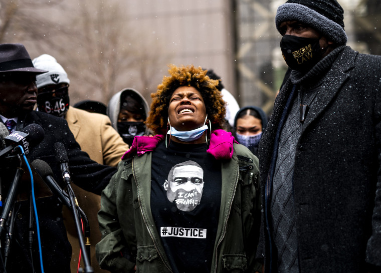 Image: Naisha Wright, Daunte Wright's aunt, with members of George Floyd's family during a press conference outside the Hennepin County Government Center on April 13, 2021 in Minneapolis.