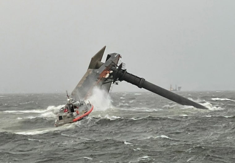 Image: A Coast Guard Station Grand Isle boat crew heading toward a capsized 175-foot commercial lift boat April 13, 2021 searching for people in the water 8 miles south of Grand Isle, La.