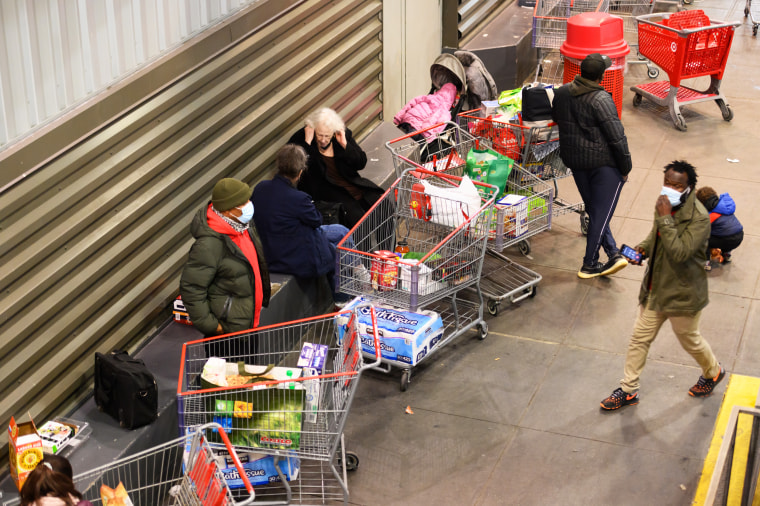 People shop for groceries at Costco in New York on Nov. 24, 2020.