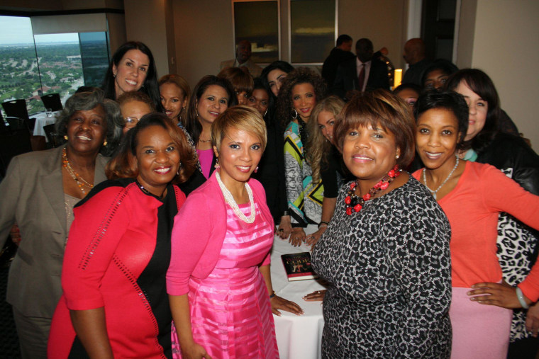 Sophia Nelson, center, in 2015 with supporters. During difficult times, Nelson says it's important to build a strong circle of women who have your back.