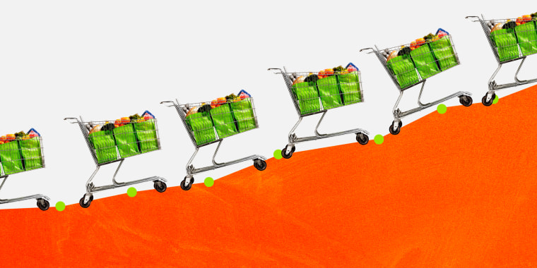 Illustration of shopping carts packed with groceries traveling up a growing line graph.