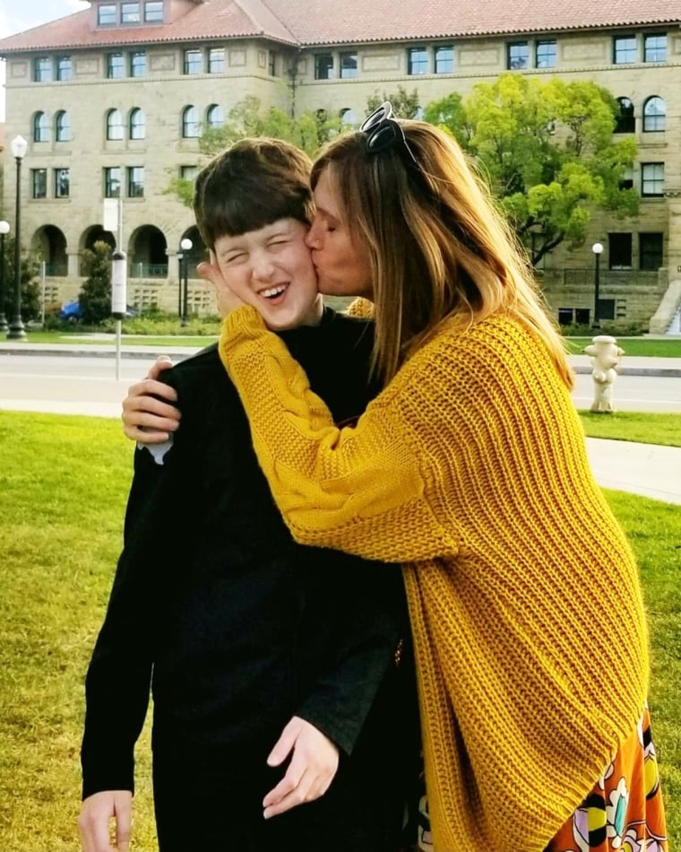 Image: Amber Briggle kissing her son