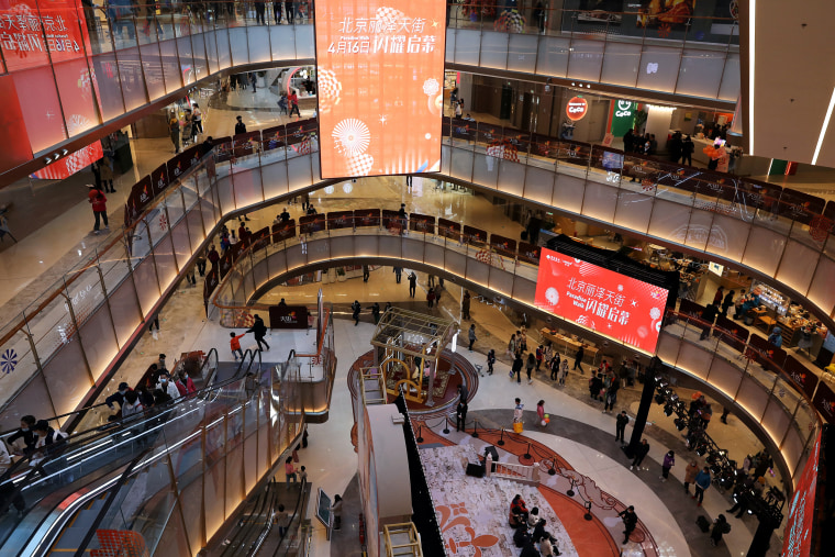 Image: People visit a newly opened shopping mall in Beijing, China