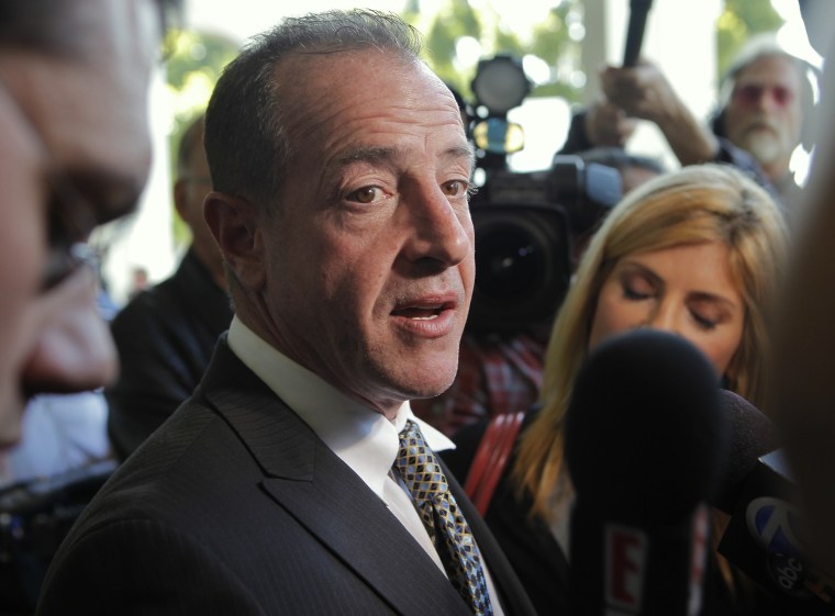 Michael Lohan, Lindsay Lohan's father, takes questions about his daughter after a hearing on May 20, 2010, in Beverly Hills, Calif.