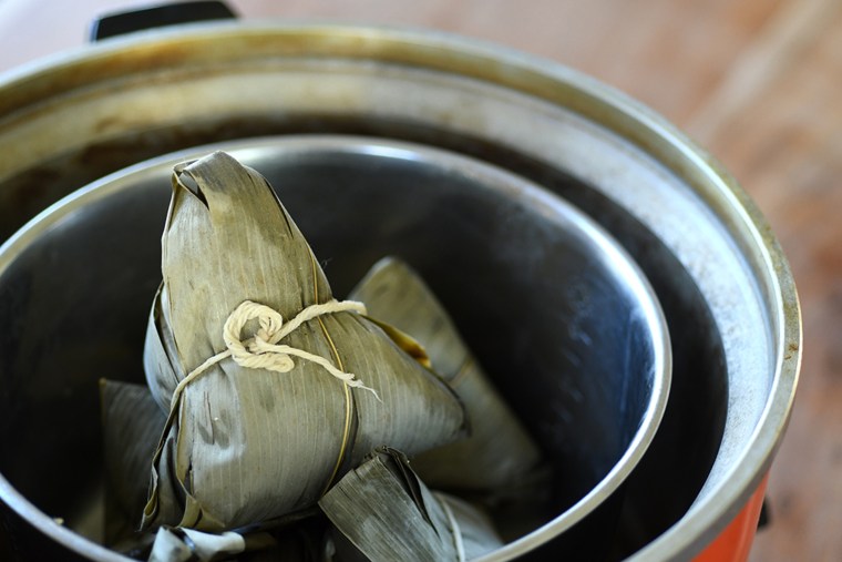 I use my rice cooker often for warming up food, like these zongzi, because it keeps the meat juicy and the rice fluffy.