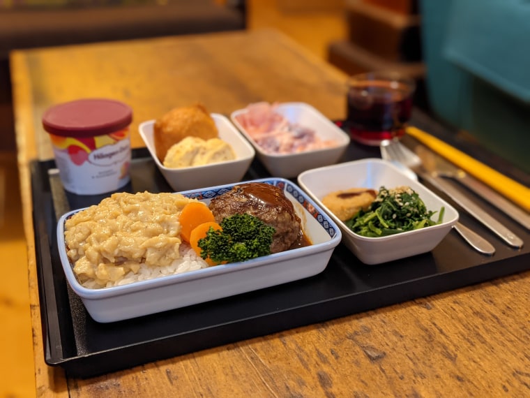 "For this meal I had to make a Japanese hamburger patty with a red wine glaze, scrambled eggs, sushi rice, Japanese sweet egg omelette, coleslaw and Korean-style spinach," said Sennhauser. "The only thing that I did not make on that tray was the little chicken nugget which came from the freezer."