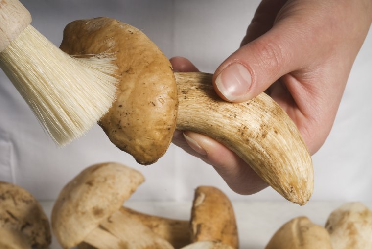 A vegetable brush can be a helpful tool for cleaning mushrooms, as you want to avoid getting them wet.