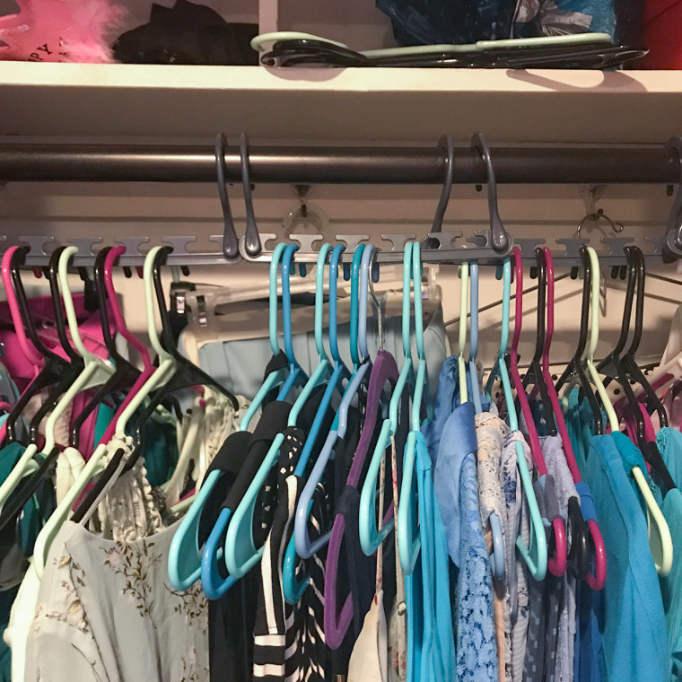 Chrissy Callahan shows her closet organized with Walmart organizer product 