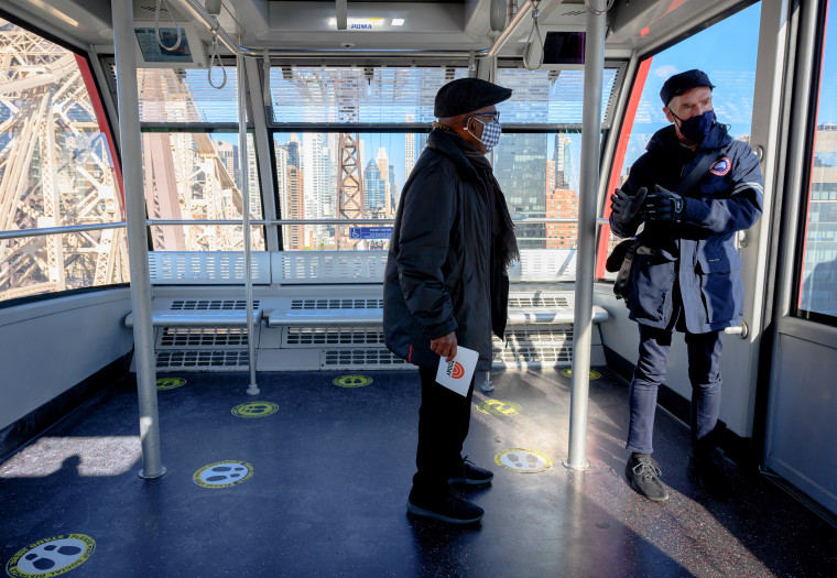 Bill Nye and Al Roker on New York City's Roosevelt Island tram.