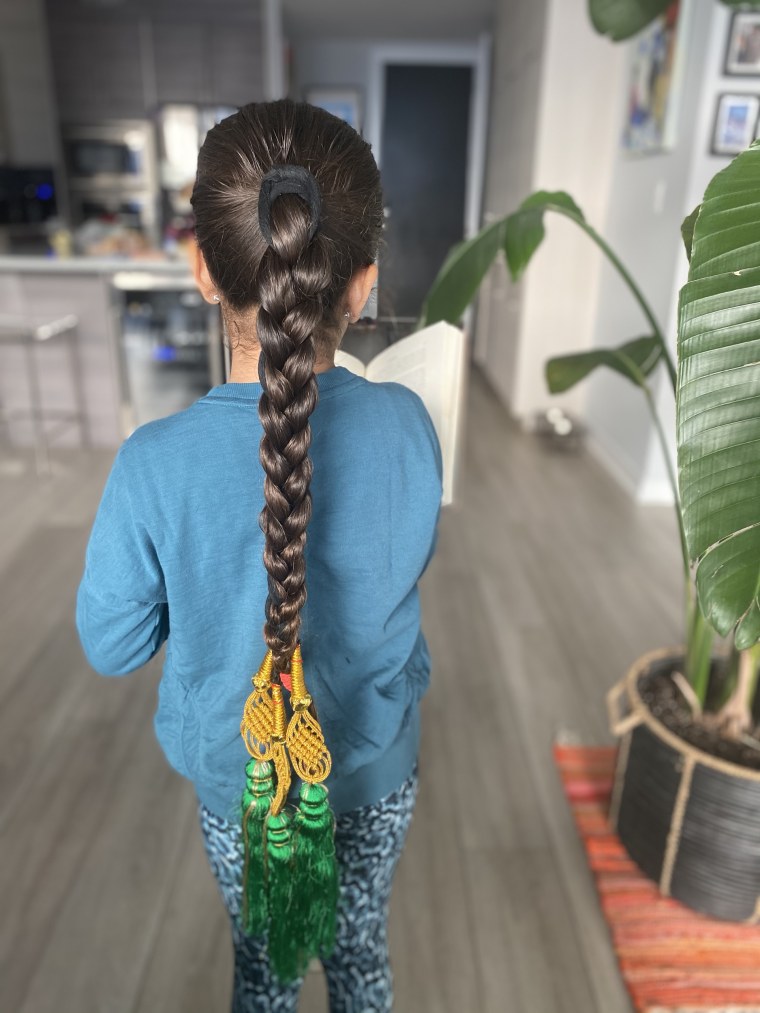 Raakhee Mirchandani's daughter's hair in a long braid