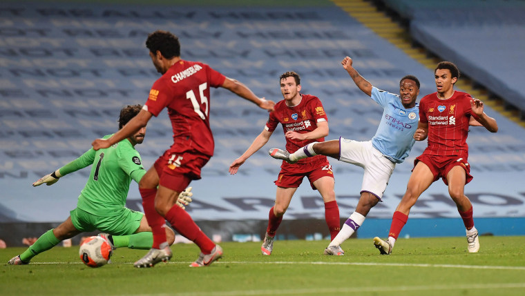 Image: Raheem Sterling of Manchester City scores the fourth goal as it is deflected off Alex Oxlade-Chamberlain during the Premier League match between Manchester City and Liverpool FC