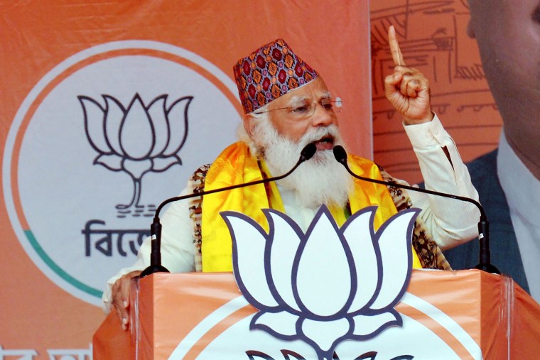 Image: Indian Prime Minister Narendra Modi gestures as he speaks in a rally in West Bengal's assembly election on April 10.