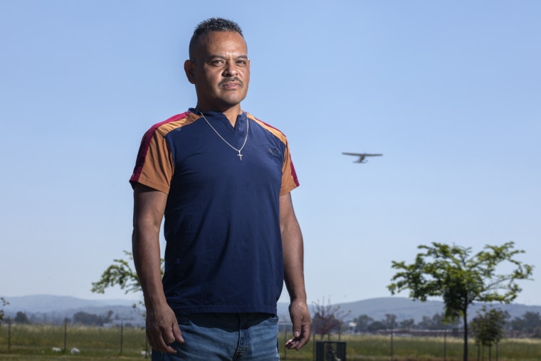 Image: Miguel Alarcon stands in Hillview Park, a block from the house where he once lived near Reid-Hillview Airport in eastern San Jose, Calif.