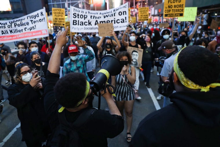 People march in New York on April 20, 2021, following the conviction of former Minneapolis police officer Derek Chauvin for the murder of George Floyd.