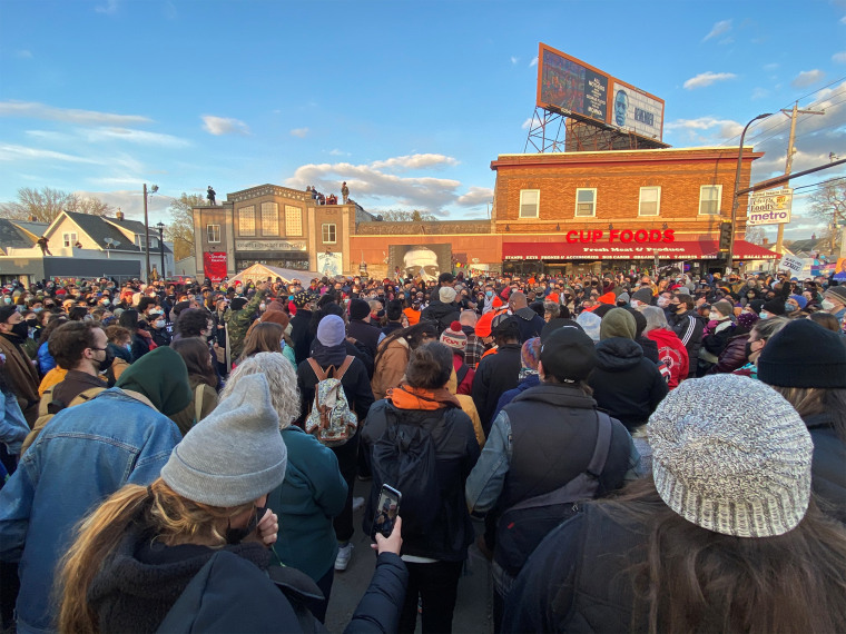 Image: People gather around the memorial to George Floyd after the Derek Chauvin trial verdict was announced, in Minneapolis, on April 20, 2021.