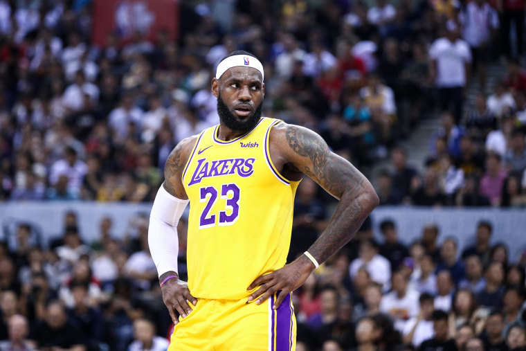 Image: LeBron James #23 of the Los Angeles Lakers reacts during the match against the Brooklyn Nets.