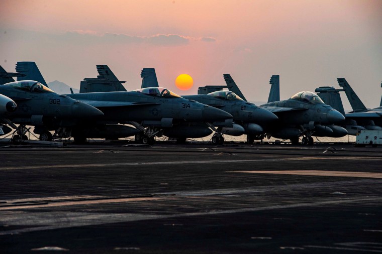 Fighter jets on the flight deck of U.S. Navy aircraft carrier USS Dwight D. Eisenhower as it transits the Suez Canal on April 2, 2021.