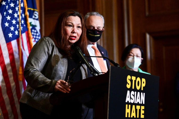 Sen. Tammy Duckworth, D-Ill., speaks alongside fellow Democrats after the Senate passed the Covid-19 Hate Crimes Act on Capitol Hill on April 22, 2021.