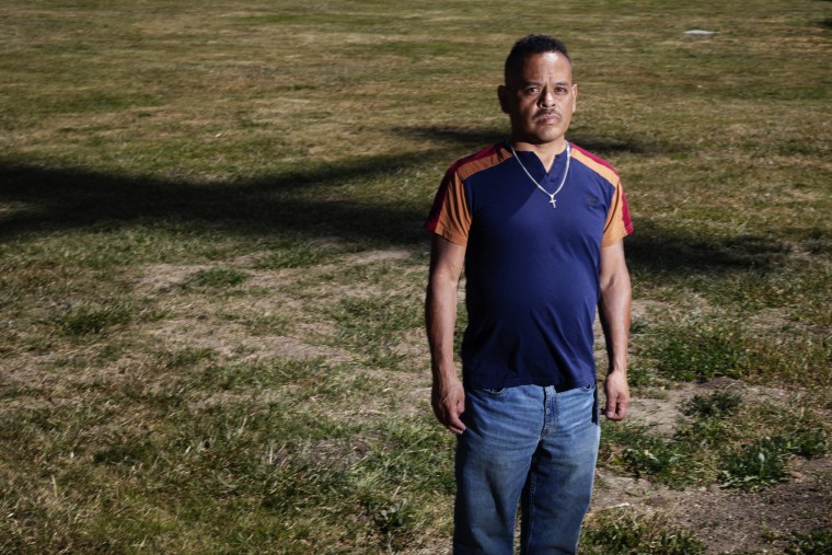 A plane casts a shadow behind Miguel Alarcon in Hillview Park in East San Jose.