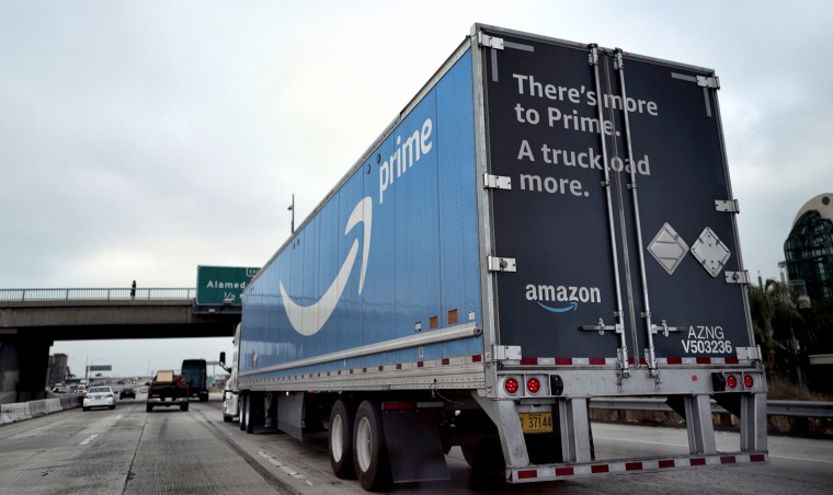An Amazon truck makes its way along Interstate 5, towards downtown Los Angeles on June 28, 2019.