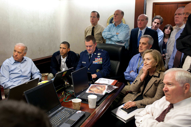 Then Secretary of State Hillary Rodham Clinton, President Barack Obama and Vice President Joe Biden, along with with members of the national security team, receive an update on the mission against Osama bin Laden in the Situation Room of the White House in Washington.