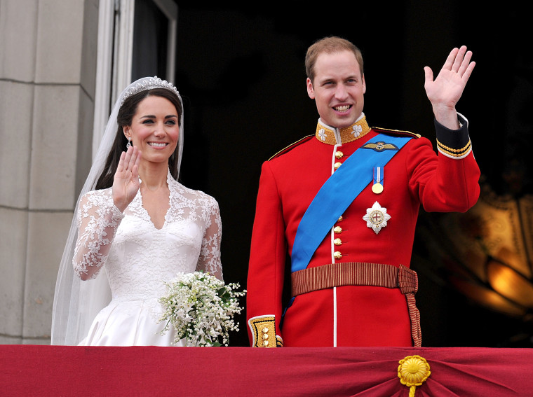Prince William and Catherine, Duchess of Cambridge, wave on the balcony of Buckingham Palace in London following their wedding.