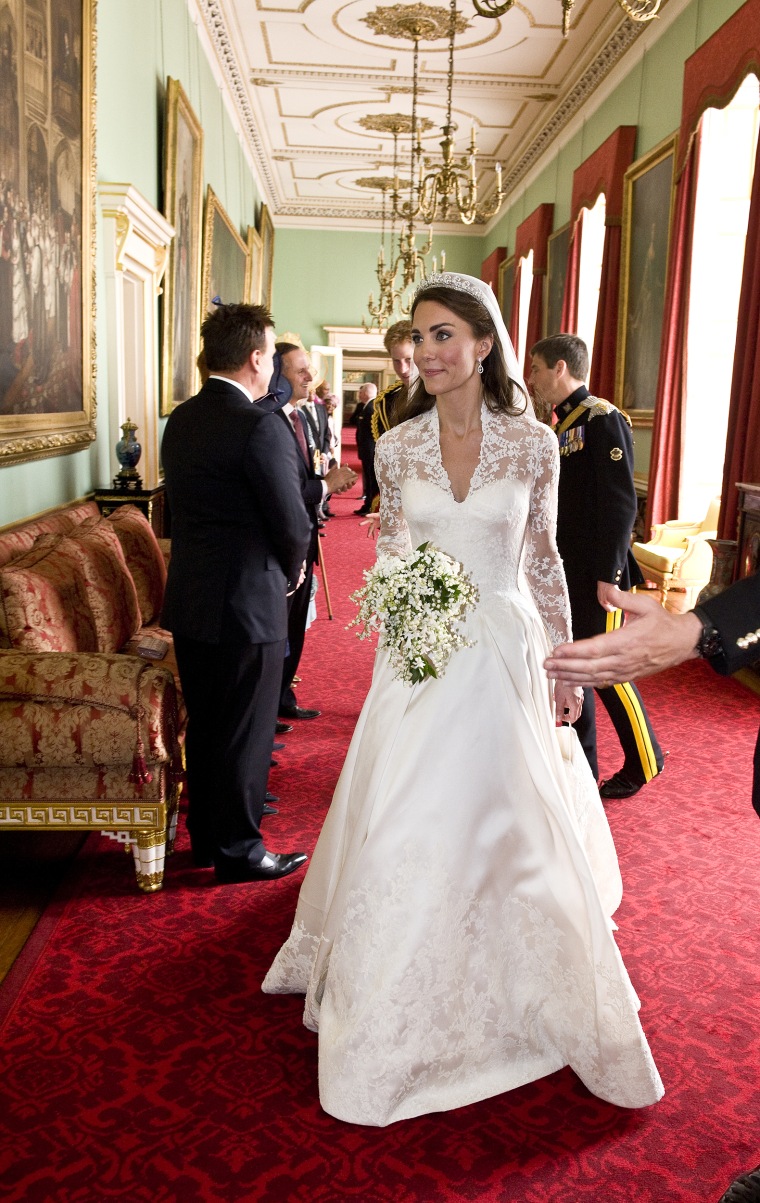 Kate Middleton Wears Lace Gown by Wedding Dress Designer