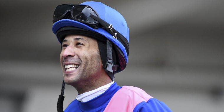 Kendrick Carmouche smiles in the paddock at Aqueduct Racetrack in the Queens borough of New York on Jan. 24, 2020.