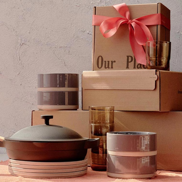 Our Place gift set with a pan, plates and cups