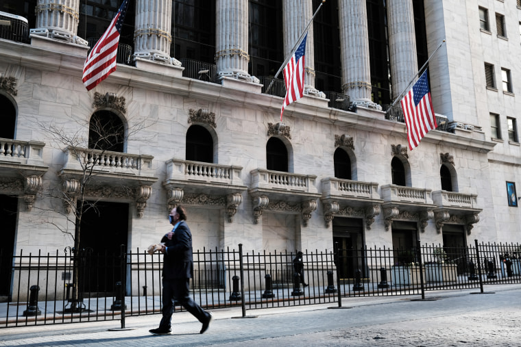 A pedestrian passes the New York Stock Exchange on Feb. 25, 2021 in New York.