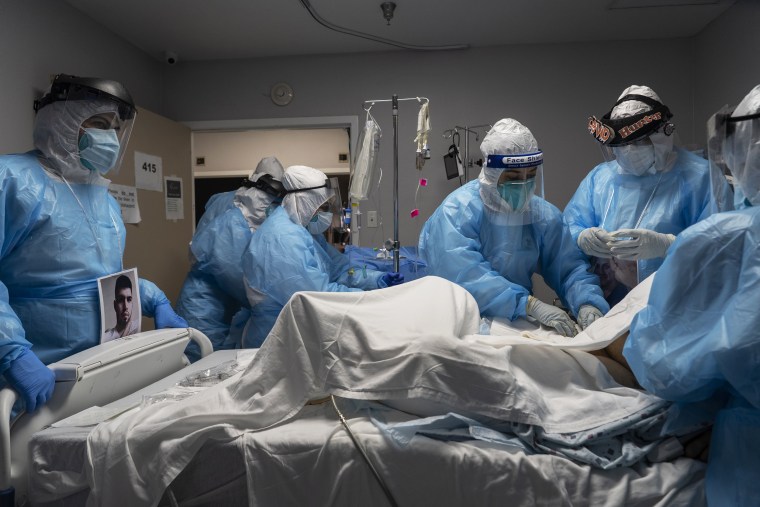 Medical staff members treat a patient suffering from Covid-19 at United Memorial Medical Center in Houston on Oct. 31, 2020.