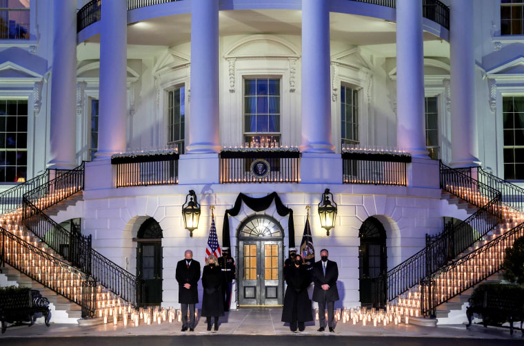 Image: President Joe Biden, first lady Jill Biden, Vice President Kamala Harris and second gentleman Doug Emhoff attend a moment of silence and candle lighting ceremony to commemorate the grim milestone of 500,000 U.S. deaths from the coronavirus disease