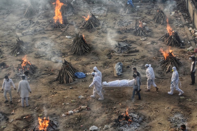 Image: Covid-19 victims being cremated at Seemapuri crematorium in New Delhi, India