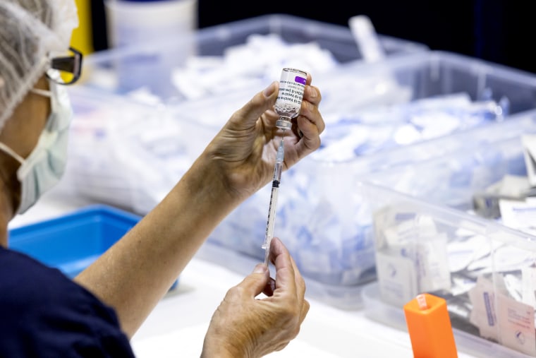 A nurse draws up doses from a multi-dose vile of AstraZeneca Covid-19 vaccine at Claremont Showground on April 28, 2021 in Perth, Australia.