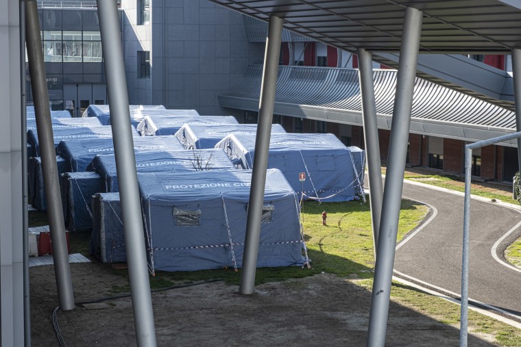 Image: Tents are set up outside a hospital in Schiavonia after Italy's first Covid-19 cases were identified nearby