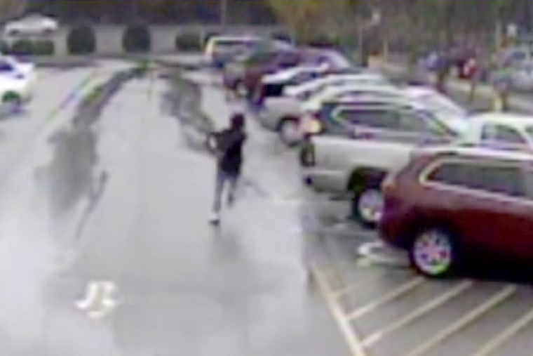 IMAGE: Ariane McCree raced out of the Walmart in Chester, S.C., after he was placed in handcuffs