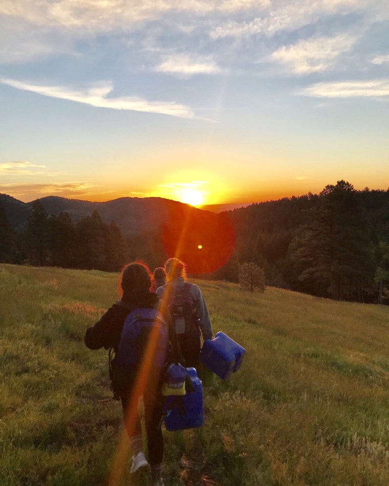 Image: Campers at Geneva Glen Camp hike to spend a night under the stars, in 2019