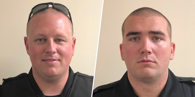 Sgt. Chris Ward (L) and K-9 Deputy Logan Fox (R) of the Watauga County Sheriff's Office were both killed in a lengthy standoff with a lone gunman in Boone, N.C. on Thursday April 29, 2021.