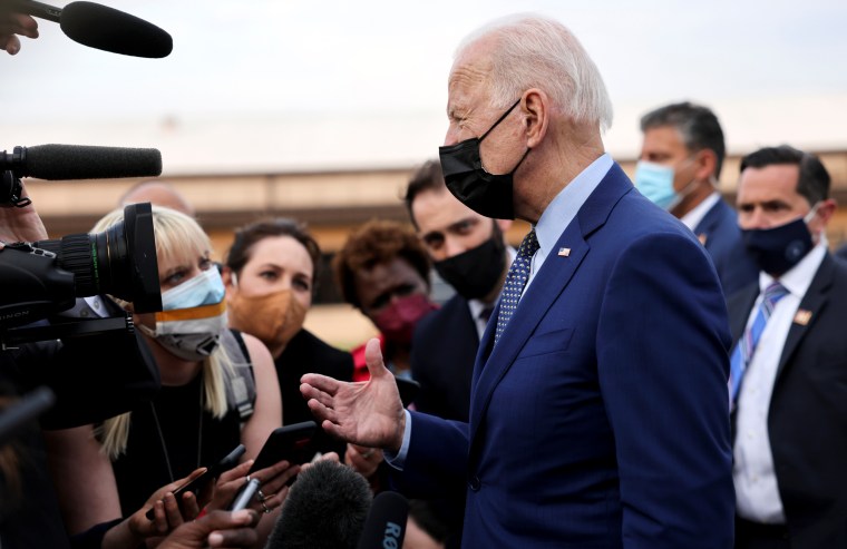 Image: U.S. President Joe Biden speaks to the press before embarking on Air Force One after attending the Democratic National Committee's \"Back on Track\" drive-in car rally, in Georgia