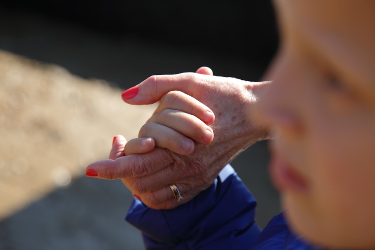 Grandmother and Grandson holding hands