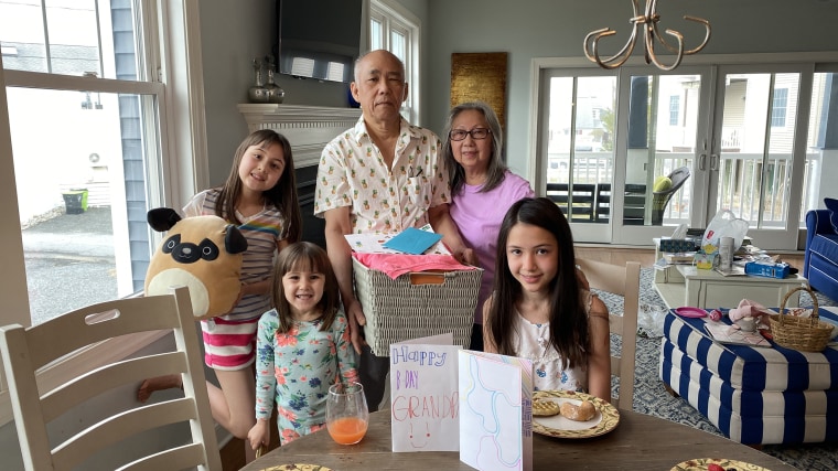 Vicky Nguyen's mom, Lynn, her dad, Huy, and her three daughters celebrate together.