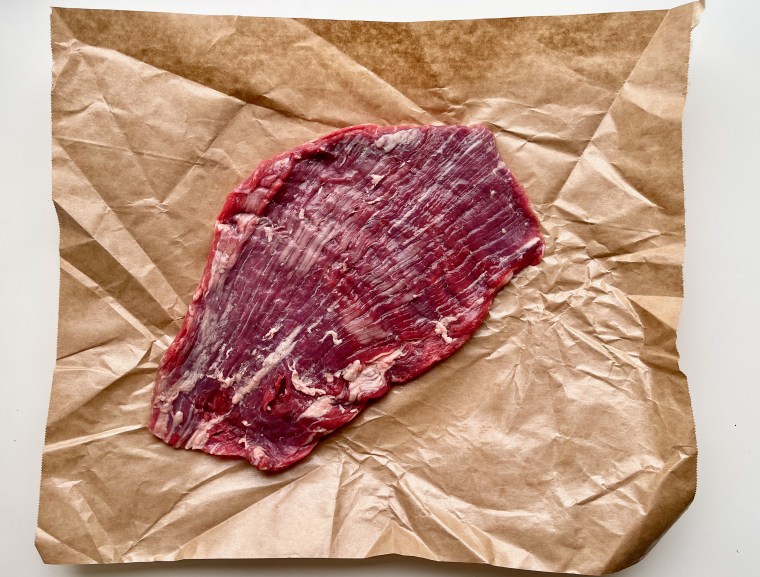 Try to find a flank steak that is as evenly sized as possible so that it cooks as evenly as possible.
