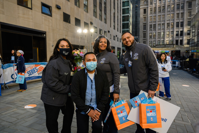 Brian Morales celebrates his lifesavers on the TODAY plaza.