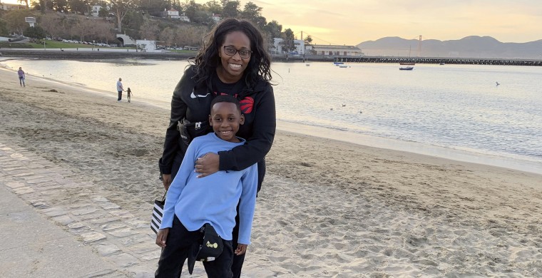 Tanya Hayles poses with her 7-year-old son Jackson. Hayles, who is a founder of Black Moms Connection, an online network of more than 16,000 Black mothers with chapters across North America and Asia, said she has noticed discussions among members about how remote learning has allowed Black mothers to better shield their children from racism. 