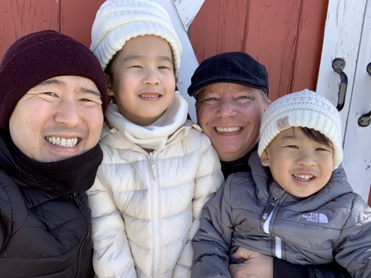 Stephen Chan with his husband and their 4-year-old daughter and 2-year-old son.