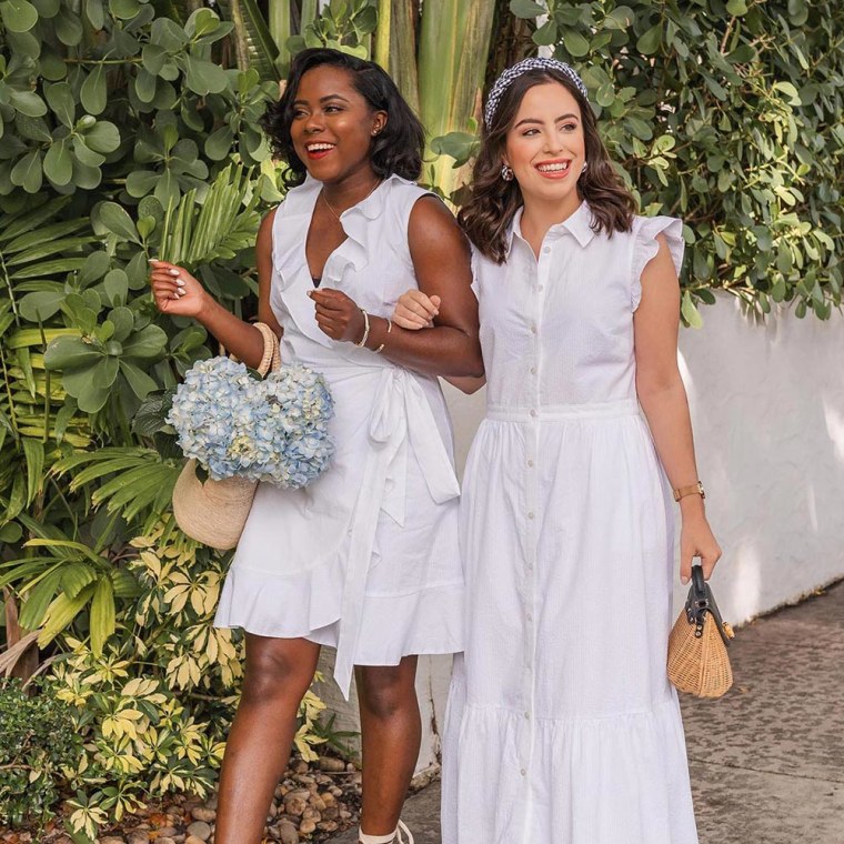 Two Woman outside walking, wearing Draper James white dresses