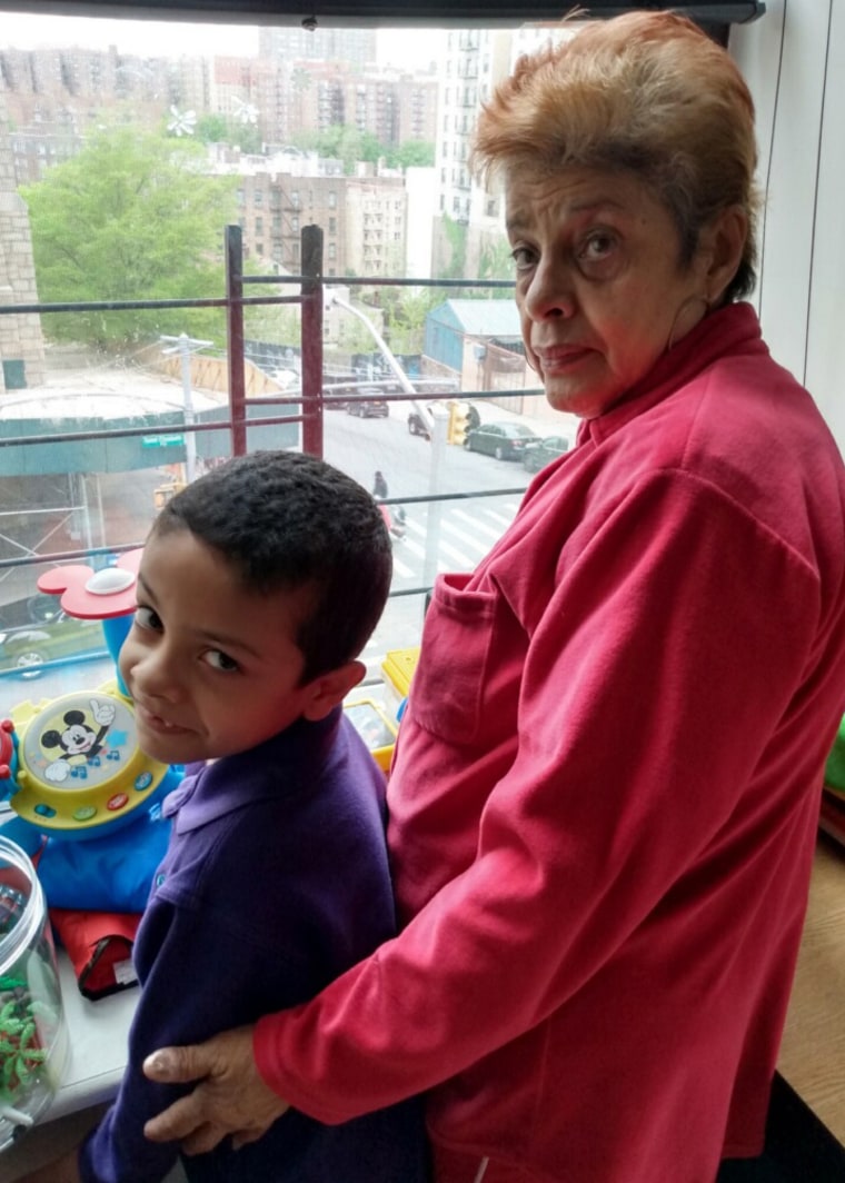 Image: Raynardo Antonio Ocasio and his grandmother, Ernestina Malave, who takes care of him in the mornings until his mother is home from work.