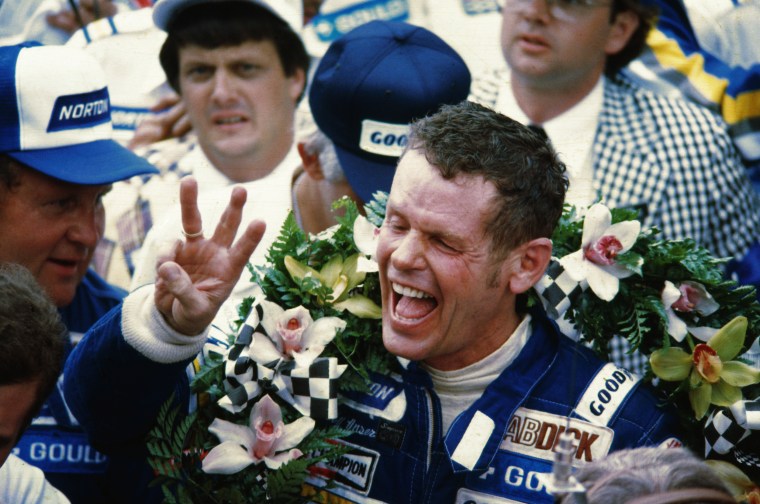 Race car driver Bobby Unser celebrates after winning the Indianapolis 500 on May 24, 1981.