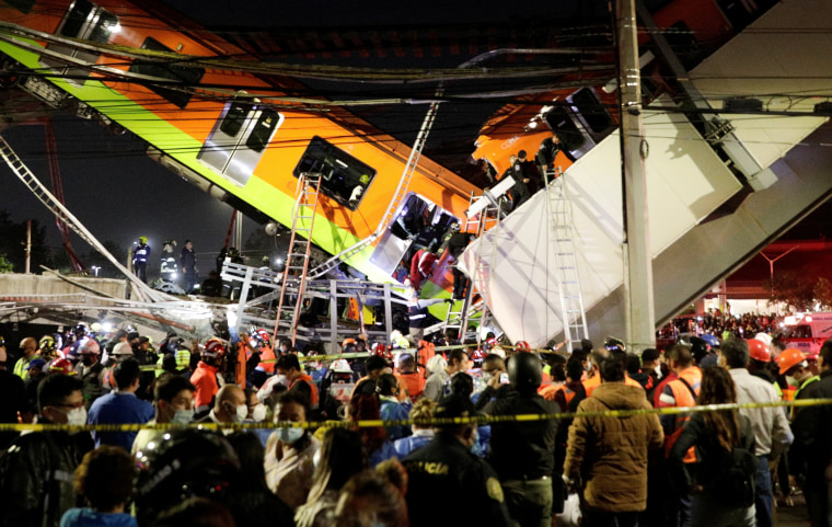 Image: Rescuers work at a site where an overpass for a metro partially collapsed with train cars on it at Olivos station in Mexico City